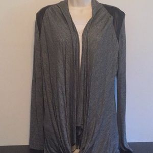 Cardigan only included